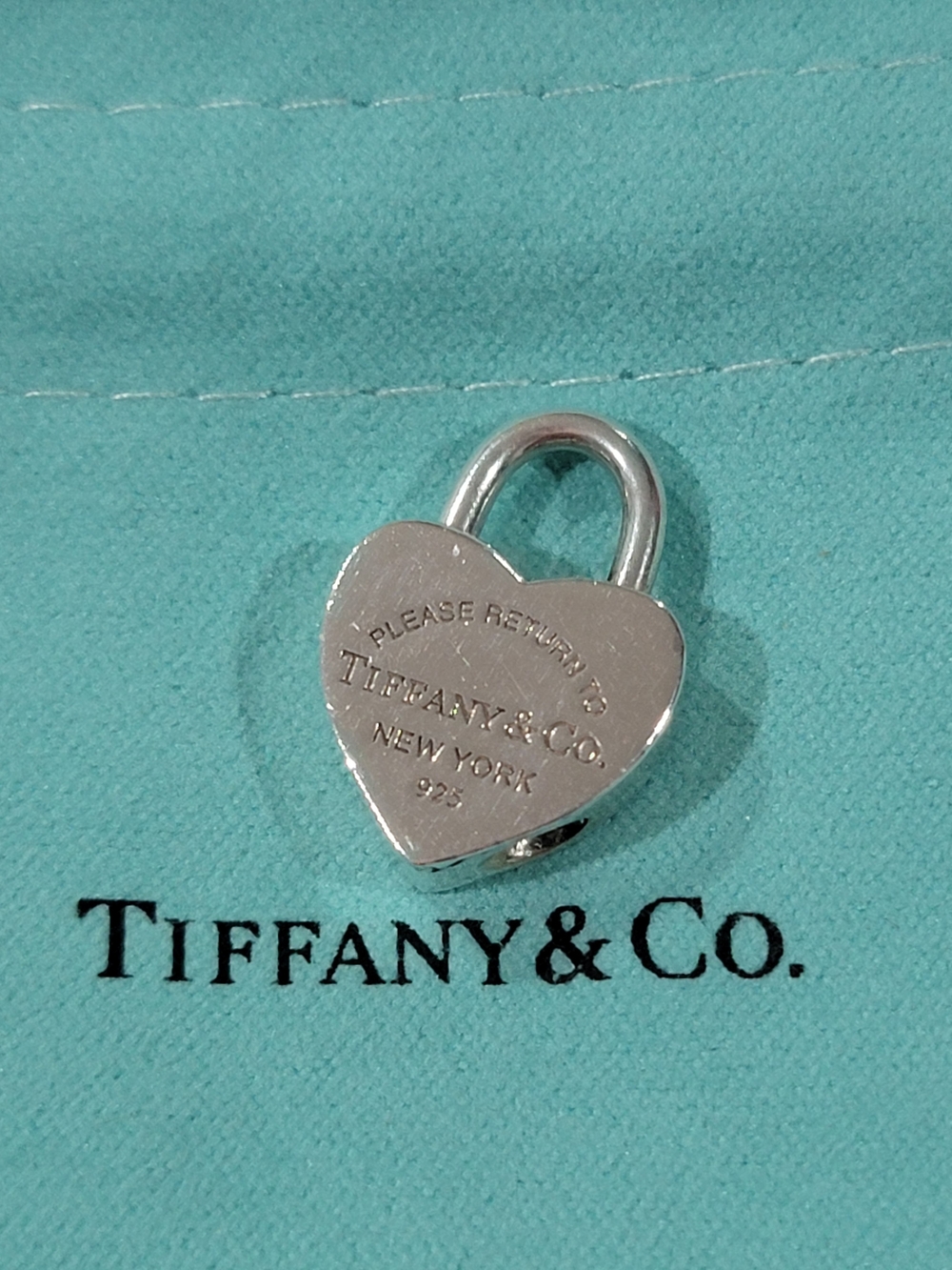 Tiffany & Co. Sterling Silver Heart Padlock Charm on Tiffany Blue